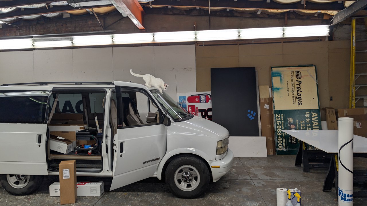 Marty Walking On Van Roof In Shop