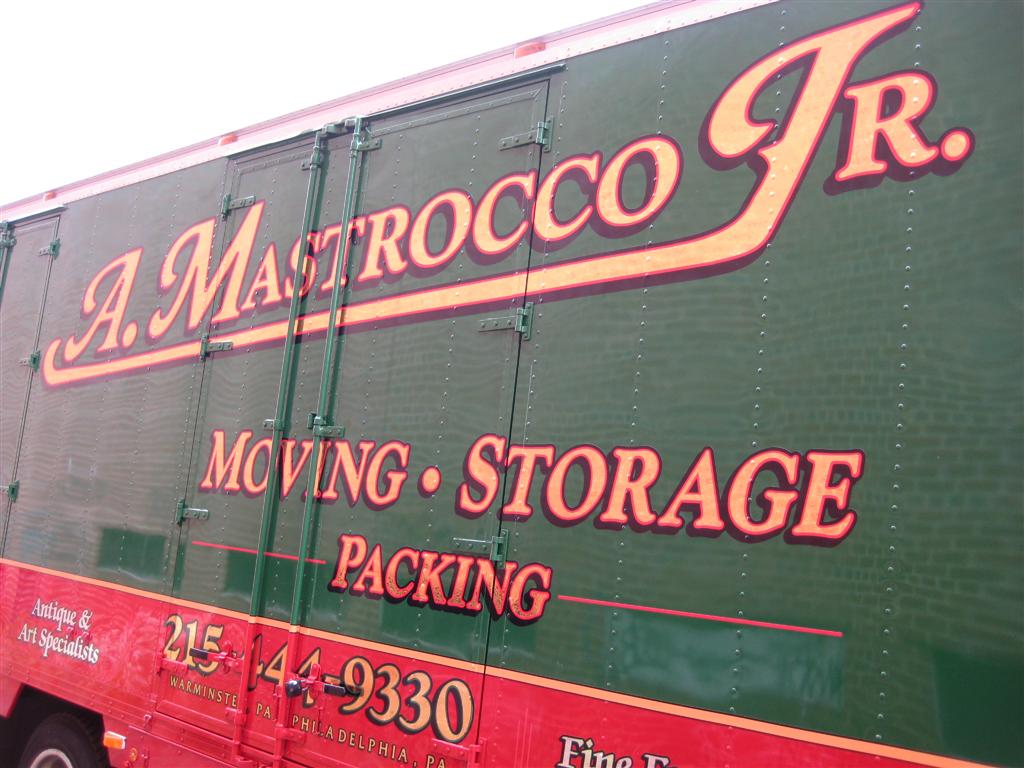 A Mastrocco Jr Moving Truck Side