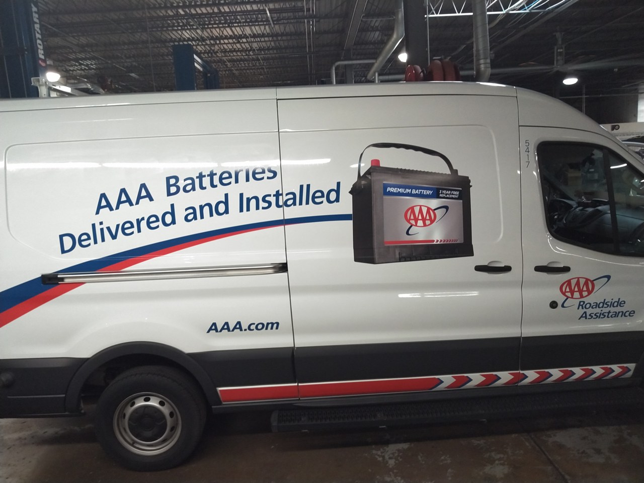 AAA Roadside Assistance Ford Transit Battery Van In Shop