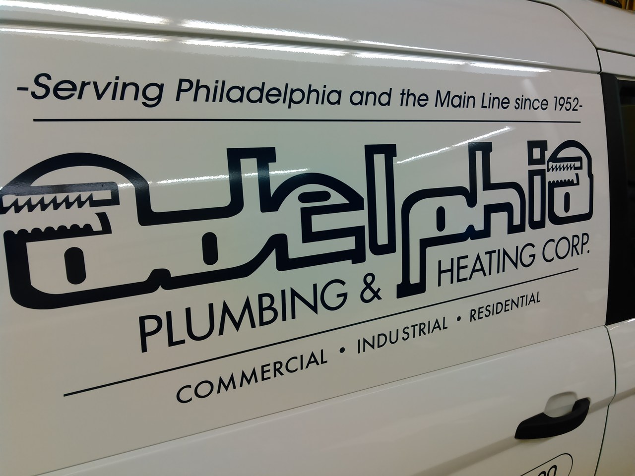 Adelphia Plumbing And Heating Corp Van Door