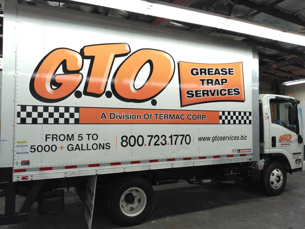 GTO Grease Trap Services Isuzu Box Truck In Shop