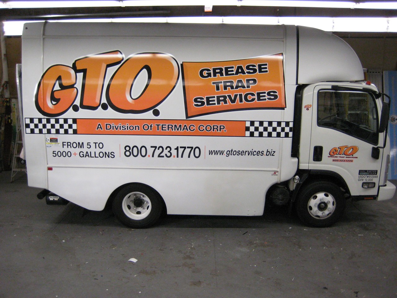 GTO Grease Trap Services Isuzu Box Truck Side