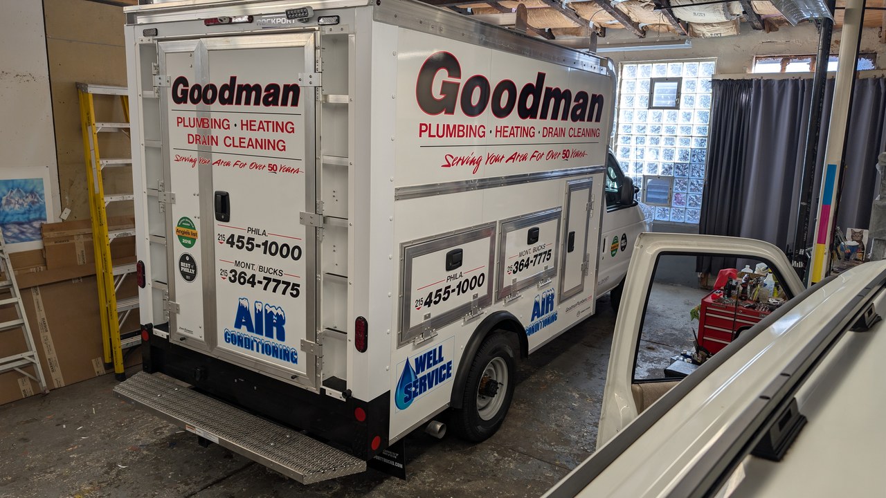 Goodman Plumbing Heating Drain Cleaning Box Van Rear