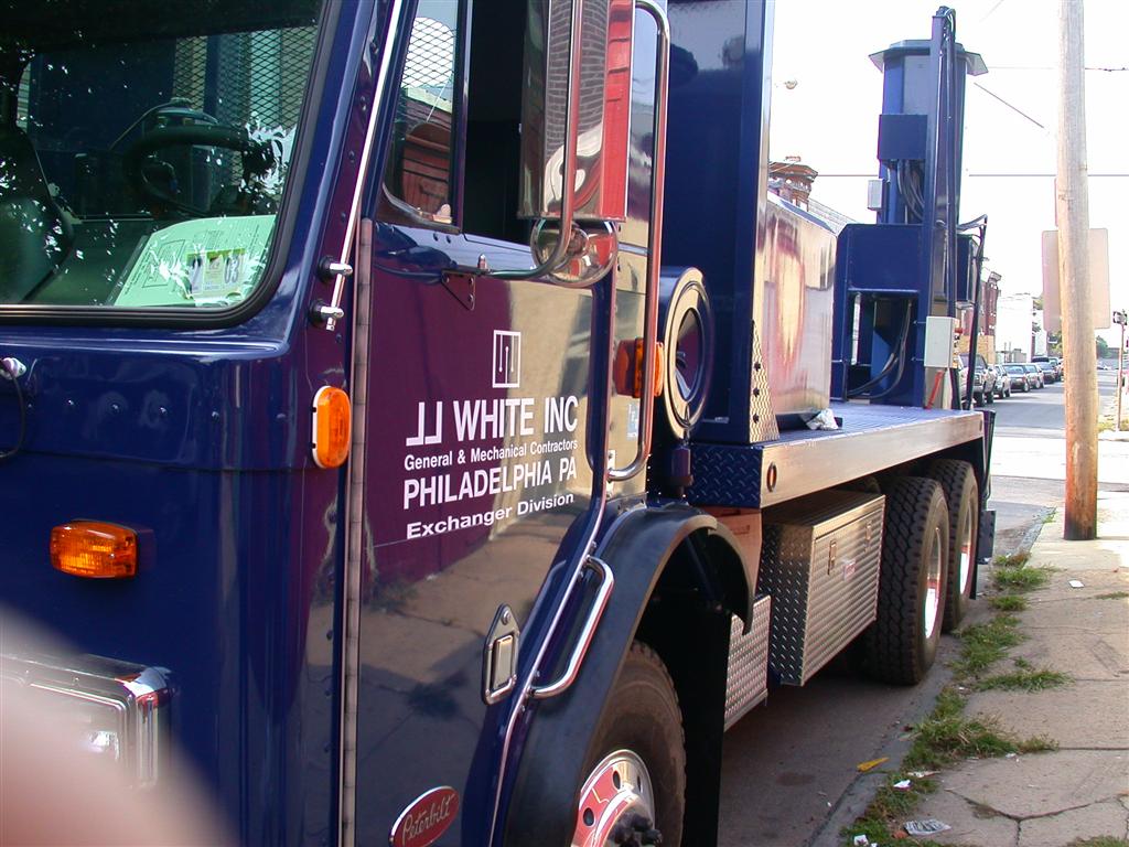 JJ White Inc Flatbed Truck