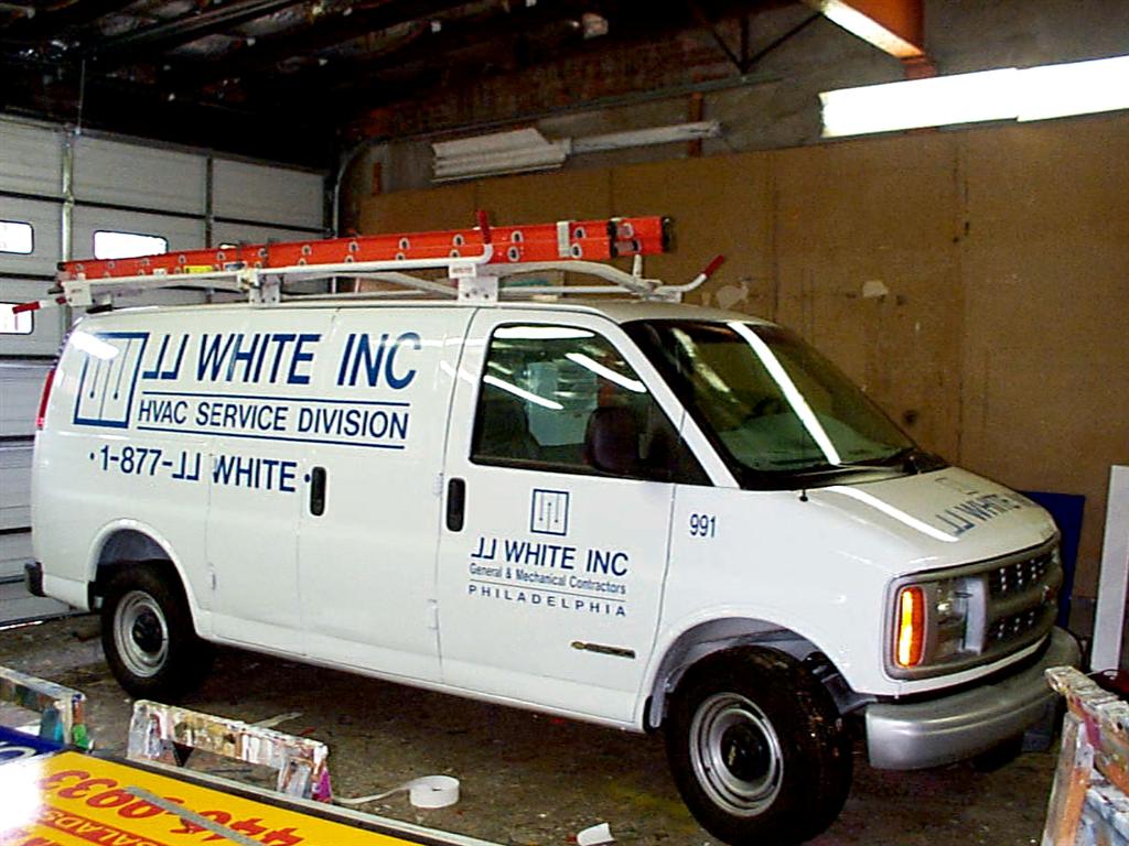 JJ White Inc Service Van