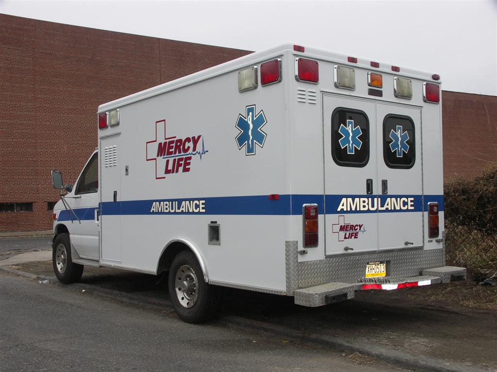 Mercy Life Ambulance Blue Stripe Rear Outdoor