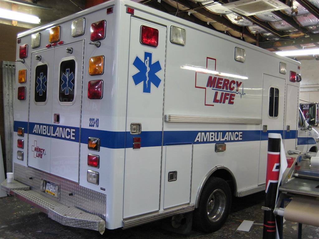 Mercy Life Ambulance Blue Stripe Rear Quarter