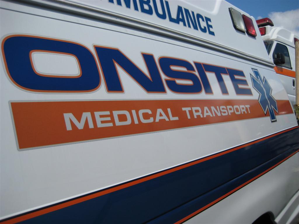 Onsite Medical Transport Ambulance Navy And Orange Graphics