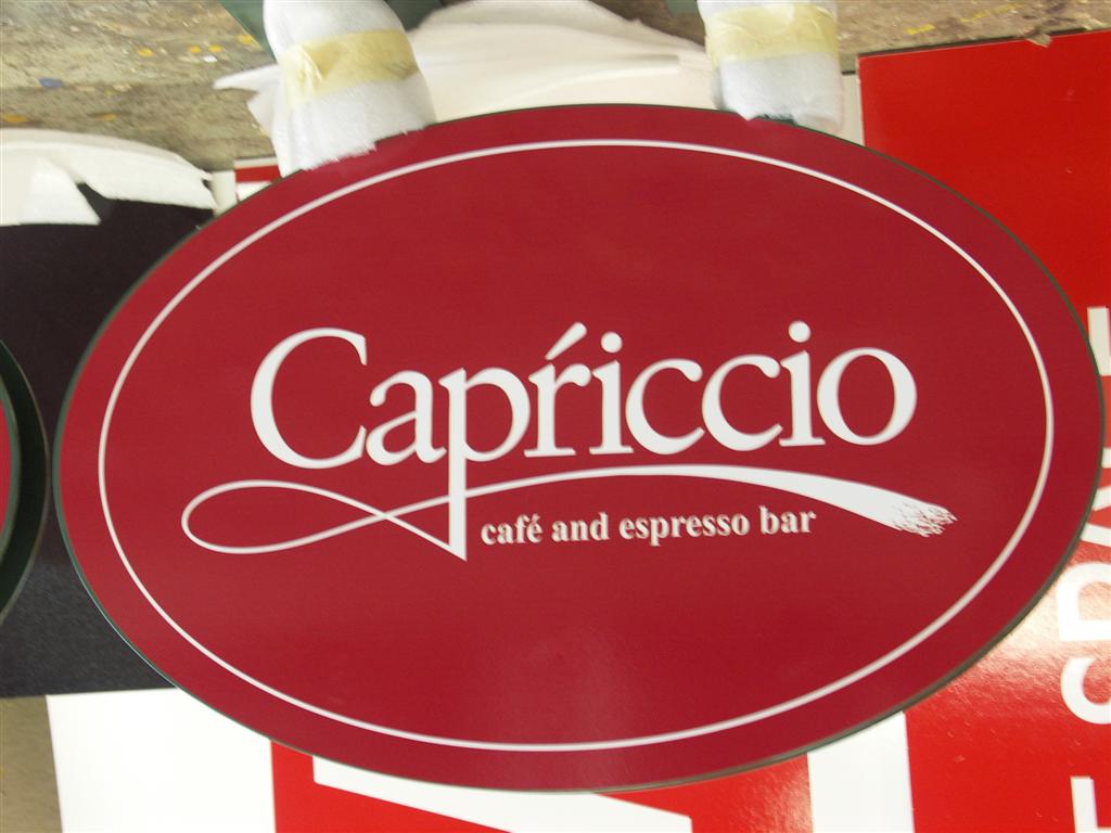 Capriccio Cafe And Espresso Bar Red Oval Sign