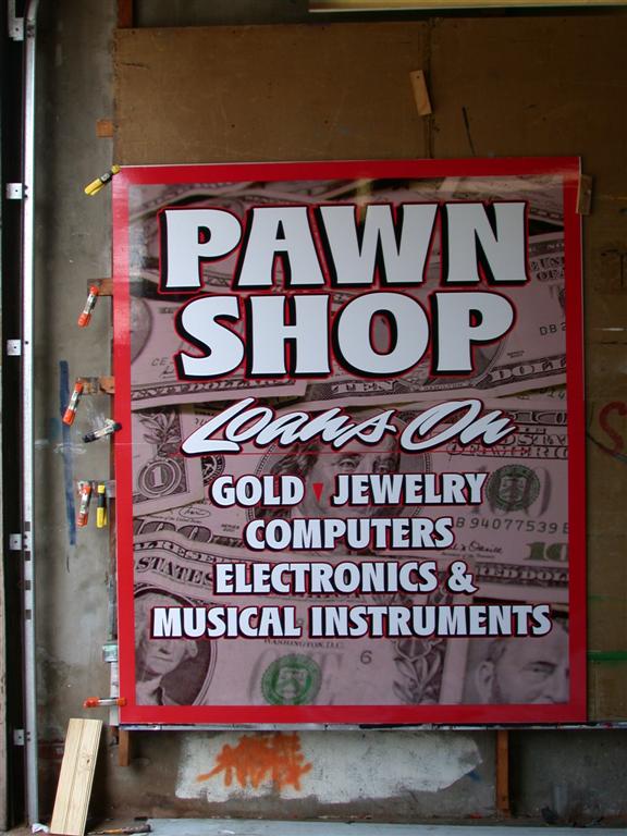 Pawn Shop Loans On Gold Jewelry Electronics Sign