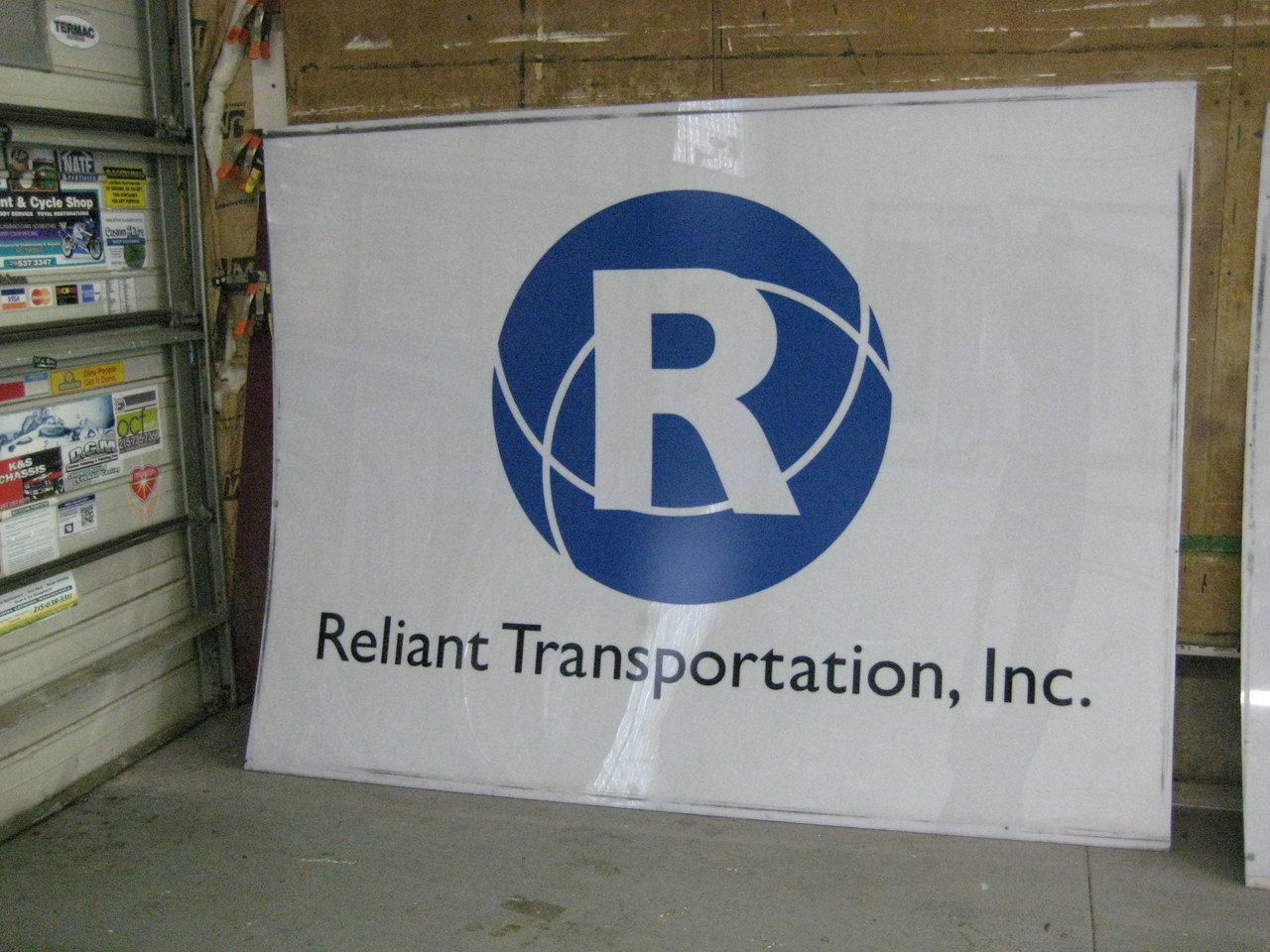 Reliant Transportation Inc Sign